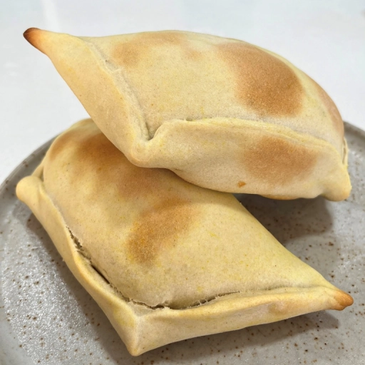 Empanada de pino de berenjena / Cristobal Robles